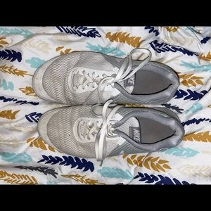 grayish nike workout shoes